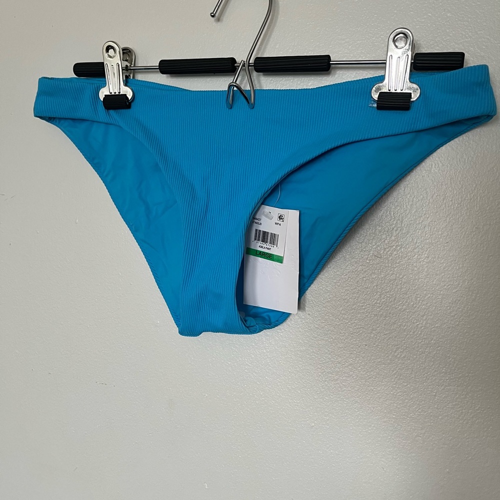 Becca blue swim bottoms, size large brand new with tags